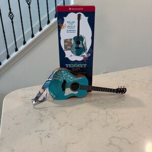 American Girl teal and white acoustic guitar accessory